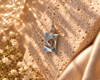 ✨ Colgante artesanal de plata – Espiral