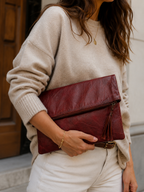 Bolso tipo clutch plegable en efecto piel envejecida
