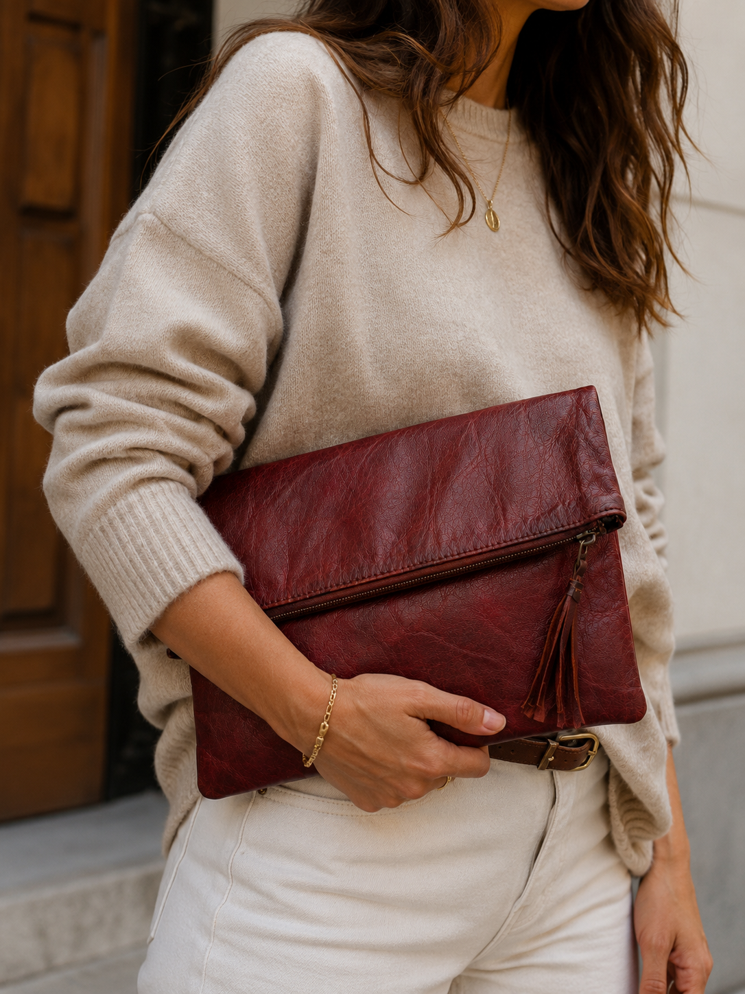 Bolso tipo clutch plegable en efecto piel envejecida